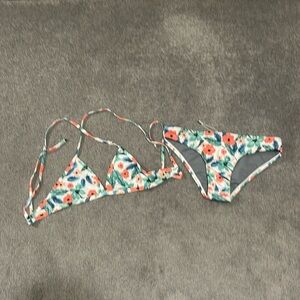 Jolyn tropical/floral print triangle bikini and Andy bottoms set both in L